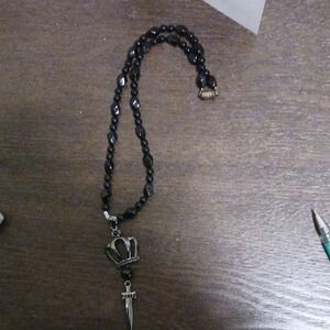 Source Unknown Black Beaded Necklace with Crown and Dagger Pendant